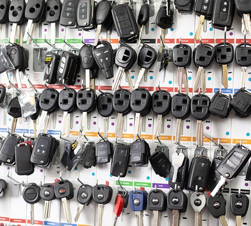 AW Auto Locks cutting a car key on-site in Essex